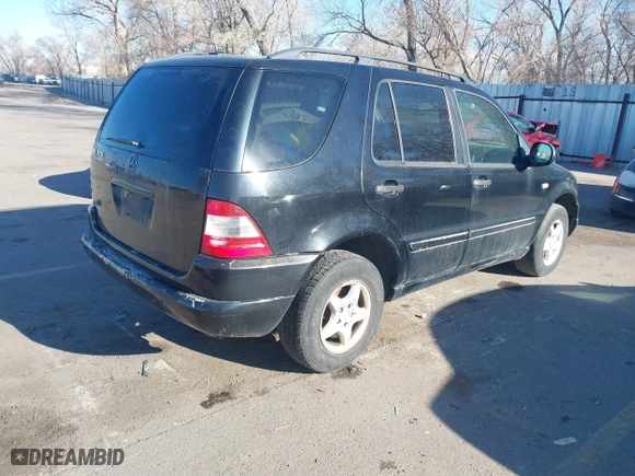 2001 Mercedes-Benz M-Class with VIN 4JGAB54E31A269408, listed as a IAAI auction lot 41642163 with 1 mi miles. Bid and sale history available at carsss.com. Image 4.