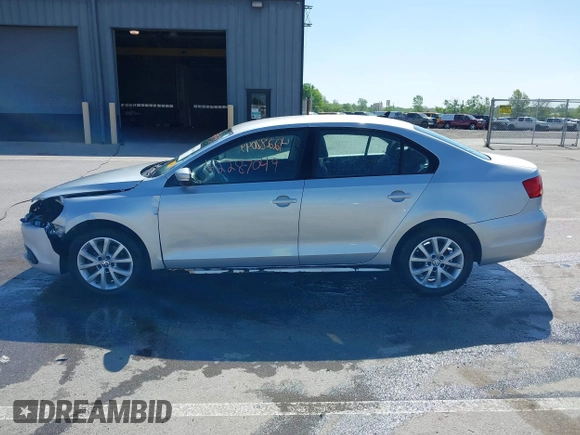 2011 Volkswagen Jetta SE with VIN 3VWDZ7AJ6BM346719, listed as a IAAI auction lot 42287049 with 179,837 mi miles and . Bid and sale history available at DreamBid. Image 14.