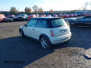 2004 MINI Hardtop with VIN WMWRC33464TJ58388, listed as a IAAI auction lot 40827409 with 102,322 mi miles and . Bid and sale history available at DreamBid. Image 3.