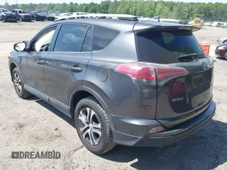 2016 Toyota RAV4 LE with VIN JTMZFREV7GJ086149, listed as a IAAI auction lot 42064251 with 90,104 mi miles and . Bid and sale history available at DreamBid. Image 3.