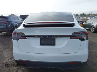 2023 Tesla Model X with VIN 7SAXCBE54PF384403, listed as a IAAI auction lot 40947187 with 16,881 mi miles and . Bid and sale history available at DreamBid. Image 17.