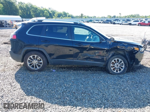 2019 Jeep Cherokee Latitude Plus with VIN 1C4PJMLBXKD229927, listed as a IAAI auction lot 42238552 with 90,984 mi miles and . Bid and sale history available at DreamBid. Image 13.