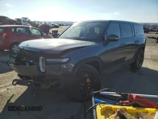 2025 Rivian R1S Premium z VIN 7PDSGCBP5SN061908, wystawiony jako Copart lot #88415455 z przebiegiem Nie podano mil oraz Szkody całkowita. Historia ofert i sprzedaży dostępna na DreamBid. Obrazek 1.