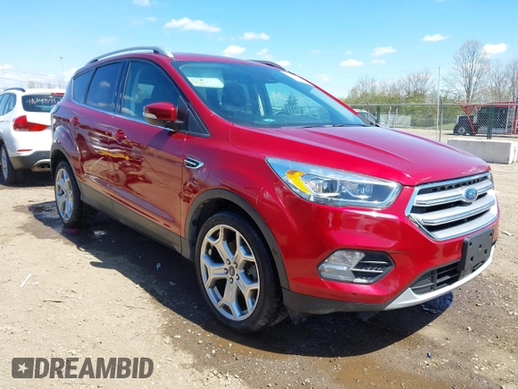 2017 Ford Escape Titanium with VIN 1FMCU9J96HUA68094, listed as a IAAI auction lot 42043893 with 85,893 mi miles. Bid and sale history available at carsss.com. Image 1.