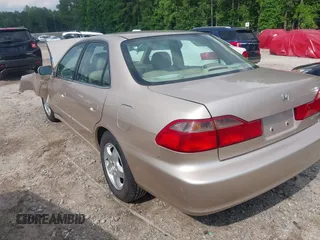 2000 Honda Accord EX z VIN 1HGCG1653YA030361, wystawiony jako IAAI lot #42268744 z przebiegiem 53 809 mil mil oraz . Historia ofert i sprzedaży dostępna na DreamBid. Obrazek 3.