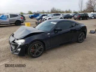 2014 Scion FR-S z VIN JF1ZNAA19E9709220, wystawiony jako Copart lot #54389725 z przebiegiem 123 443 mil mil oraz Szkoda całkowita • Salvage title. Historia ofert i sprzedaży dostępna na DreamBid. Obrazek 1.