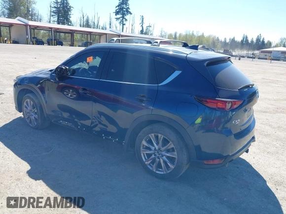 2020 Mazda CX-5 Grand Touring with VIN JM3KFBDM7L0724005, listed as a IAAI auction lot 42034658 with 90,631 mi miles. Bid and sale history available at carsss.com. Image 3.