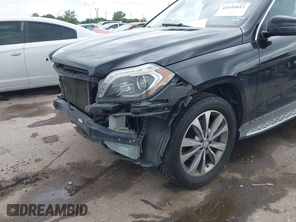 2014 Mercedes-Benz GL 450 with VIN 4JGDF7CE0EA372225, listed as a IAAI auction lot 42141012 with 158,045 mi miles and . Bid and sale history available at DreamBid. Image 6.