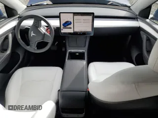2024 Tesla Model Y Long Range с VIN 7SAYGDEE5RF983771, выставлен на аукционе Copart как лот 86153274 с пробегом 4 105 миль миль и Списание • Salvage title. История ставок и продаж доступна на DreamBid. Изображение 8.