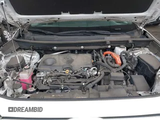 2022 Toyota RAV4 Hybrid XLE with VIN 2T3RWRFV9NW130472, listed as a IAAI auction lot 40990707 with 156,174 mi miles and . Bid and sale history available at DreamBid. Image 10.