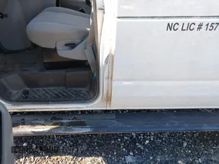 2014 Ford Econoline Cargo Commercial with VIN 1FTNE2EW3EDA18900, listed as a IAAI auction lot 41209002 with 138,014 mi miles. Bid and sale history available at carsss.com. Image 6.