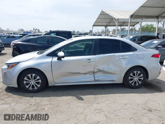 2022 Toyota Corolla Hybrid LE with VIN JTDEAMDE6NJ056705, listed as a IAAI auction lot 42032119 with 197,030 mi miles. Bid and sale history available at carsss.com. Image 14.