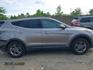 2018 Hyundai Santa Fe 2.4L z VIN 5NMZUDLB4JH073857, wystawiony jako IAAI lot #42200208 z przebiegiem 127 038 mil mil oraz . Historia ofert i sprzedaży dostępna na DreamBid. Obrazek 14.