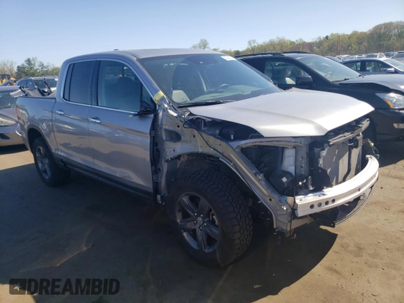 2023 Honda Ridgeline RTL-E with VIN 5FPYK3F77PB059763, listed as a Copart auction lot 54026045 with 34,114 mi miles and Salvage title. Bid and sale history available at DreamBid. Image 4.