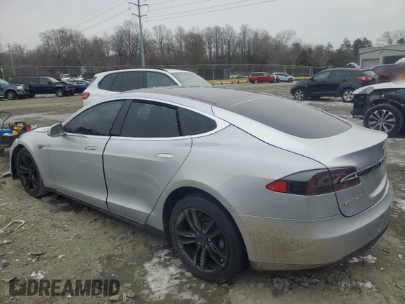 2013 Tesla Model S with VIN 5YJSA1AC9DFP10705, listed as a Copart auction lot 89394665 with Not Provided miles and Salvage Title. Bid and sale history available at carsss.com. Image 2.