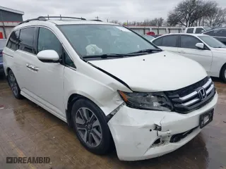 2016 Honda Odyssey Touring Elite with VIN 5FNRL5H9XGB100116, listed as a IAAI auction lot 41543464 with 160,763 mi miles. Bid and sale history available at carsss.com. Image 1.