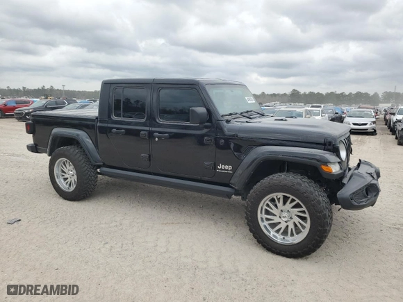 2023 Jeep Gladiator Overland with VIN 1C6HJTFG2PL559314, listed as a Copart auction lot 44985505 with 9,434 mi miles and Salvage Title. Bid and sale history available at carsss.com. Image 4.