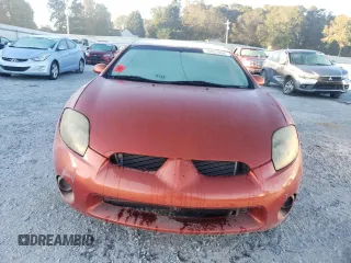 2006 Mitsubishi Eclipse GS z VIN 4A3AK24F96E010821, wystawiony jako Copart lot #70957064 z przebiegiem Nie podano mil oraz Nie do naprawy • Non repairable. Historia ofert i sprzedaży dostępna na DreamBid. Obrazek 5.