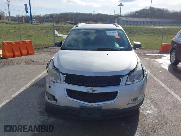 2012 Chevrolet Traverse LS z VIN 1GNKRFED7CJ330186, wystawiony jako IAAI lot #41806198 z przebiegiem 132 703 mil mil oraz . Historia ofert i sprzedaży dostępna na DreamBid. Obrazek 12.