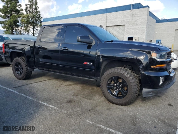 2017 Chevrolet Silverado 1500 LTZ with VIN 3GCUKSECXHG440566, listed as a Copart auction lot 51677165 with 140,659 mi miles and Salvage Title. Bid and sale history available at carsss.com. Image 4.
