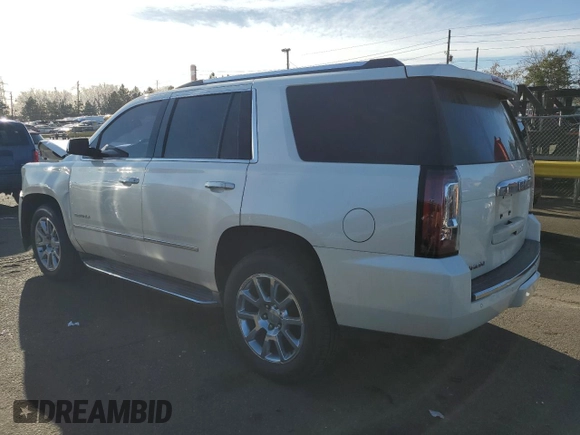 2015 GMC Yukon Denali with VIN 1GKS2CKJ7FR183710, listed as a Copart auction lot 49074135 with 230,526 mi miles and Salvage Title. Bid and sale history available at carsss.com. Image 2.