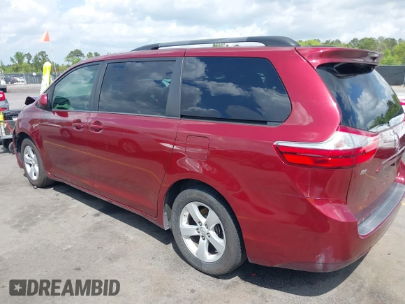 2015 Toyota Sienna LE AAS with VIN 5TDKK3DC7FS685452, listed as a IAAI auction lot 41942789 with 194,163 mi miles. Bid and sale history available at carsss.com. Image 3.