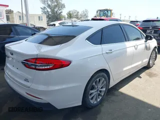 2020 Ford Fusion SE with VIN 3FA6P0LU9LR227928, listed as a IAAI auction lot 42445186 with 59,431 mi miles and . Bid and sale history available at DreamBid. Image 4.