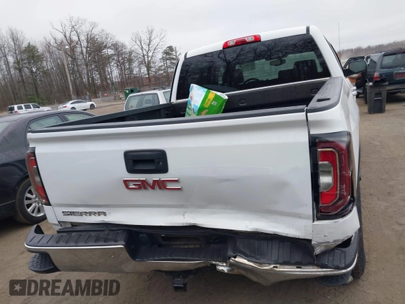2018 GMC Sierra 1500 SLT z VIN 3GTU2NEC1JG402263, wystawiony jako IAAI lot #41786328 z przebiegiem 100 097 mil mil oraz . Historia ofert i sprzedaży dostępna na DreamBid. Obrazek 16.