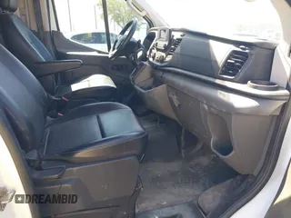 2020 Ford Transit Cargo z VIN 1FTBR1Y8XLKB35493, wystawiony jako IAAI lot #41887907 z przebiegiem 95 858 mil mil oraz . Historia ofert i sprzedaży dostępna na DreamBid. Obrazek 5.