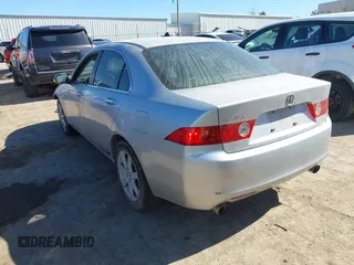 2004 Acura TSX w/Navigation with VIN JH4CL969X4C036084, listed as a IAAI auction lot 41726150 with 177,757 mi miles. Bid and sale history available at carsss.com. Image 3.