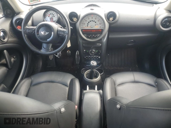 2012 MINI Countryman S with VIN WMWZC3C50CWM28043, listed as a Copart auction lot 64701505 with 166,819 mi miles and Salvage title. Bid and sale history available at DreamBid. Image 8.