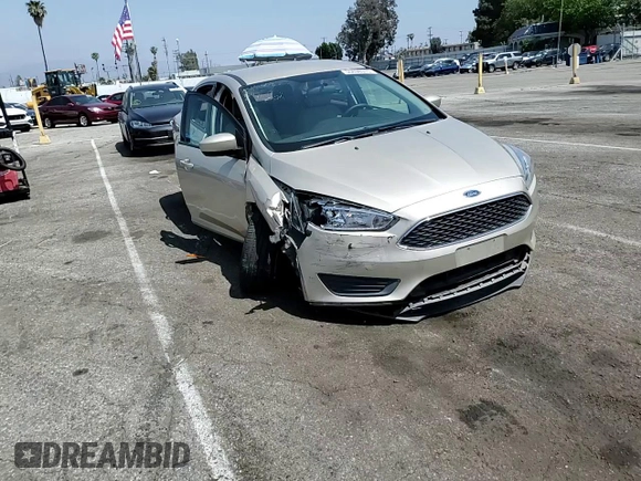 2018 Ford Focus SE z VIN 1FADP3F23JL303948, wystawiony jako Copart lot #55698915 z przebiegiem 85 500 mil mil oraz Szkoda całkowita • Salvage title. Historia ofert i sprzedaży dostępna na DreamBid. Obrazek 13.