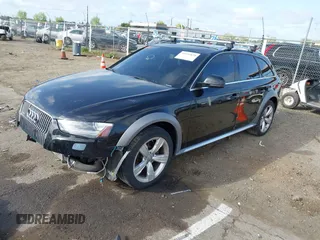 2014 Audi allroad Premium Plus with VIN WA1UFAFLXEA020789, listed as a IAAI auction lot 41959838 with 133,520 mi miles. Bid and sale history available at carsss.com. Image 2.