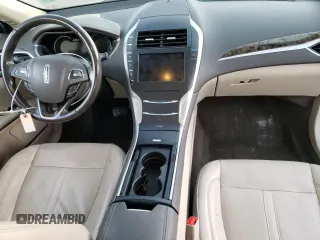 2016 Lincoln MKZ with VIN 3LN6L2GK6GR606154, listed as a Copart auction lot 40676704 with 56,996 mi miles and Salvage Title. Bid and sale history available at carsss.com. Image 8.
