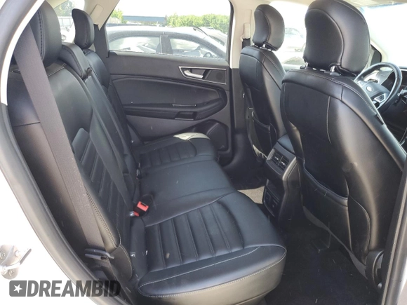 2019 Ford Edge SEL z VIN 2FMPK4J98KBB34524, wystawiony jako Copart lot #57313615 z przebiegiem 112 193 mil mil oraz Szkoda całkowita • Salvage title. Historia ofert i sprzedaży dostępna na DreamBid. Obrazek 11.