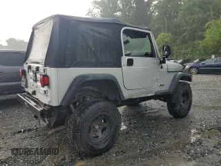 2004 Jeep Wrangler X with VIN 1J4FA39S84P718805, listed as a Copart auction lot 59949875 with 119,295 mi miles and Salvage title. Bid and sale history available at DreamBid. Image 3.