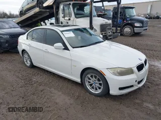 2010 BMW 3 Series 328i with VIN WBAPH7G51ANM52218, listed as a IAAI auction lot 41066937 with 129,932 mi miles and . Bid and sale history available at carsss.com. Image 1.
