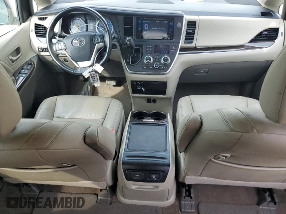 2016 Toyota Sienna XLE with VIN 5TDYK3DC3GS730639, listed as a Copart auction lot 57379935 with 105,323 mi miles and Salvage title. Bid and sale history available at DreamBid. Image 8.