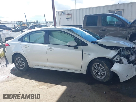 2021 Toyota Corolla Hybrid LE with VIN JTDEAMDE7MJ012694, listed as a IAAI auction lot 41794233 with 103,363 mi miles. Bid and sale history available at carsss.com. Image 14.
