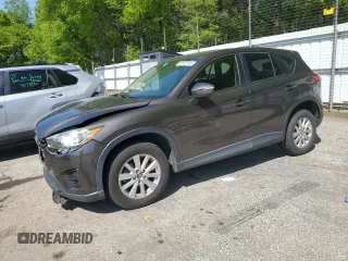 2016 Mazda CX-5 Sport with VIN JM3KE4BY4G0805179, listed as a Copart auction lot 52412745 with 85,928 mi miles and Salvage Title. Bid and sale history available at carsss.com. Image 1.