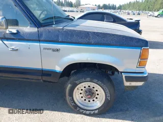 1989 Ford Bronco z VIN 1FMCU14T7KUB49671, wystawiony jako IAAI lot #42404266 z przebiegiem 22 883 mil mil oraz . Historia ofert i sprzedaży dostępna na DreamBid. Obrazek 6.
