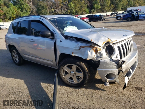 2010 Jeep Compass Sport with VIN 1J4NF4FB4AD513051, listed as a Copart auction lot 79667494 with 0 mi miles and Salvage Title. Bid and sale history available at carsss.com. Image 4.