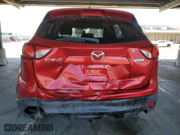 2016 Mazda CX-5 Sport with VIN JM3KE2BY8G0837203, listed as a Copart auction lot 54960845 with 116,656 mi miles and Salvage title. Bid and sale history available at DreamBid. Image 6.