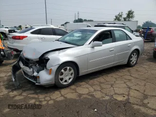 2003 Cadillac CTS with VIN 1G6DM57N730160498, listed as a Copart auction lot 60064415 with 146,834 mi miles and Salvage title. Bid and sale history available at DreamBid. Image 1.