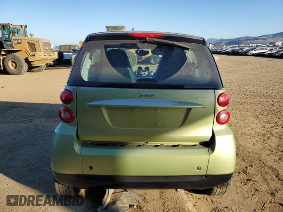 2012 Smart fortwo Pure z VIN WMEEJ3BA7CK543415, wystawiony jako Copart lot #42707385 z przebiegiem 76 280 mil mil oraz Szkody całkowita. Historia ofert i sprzedaży dostępna na DreamBid. Obrazek 6.