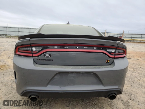 2019 Dodge Charger Scat Pack z VIN 2C3CDXGJ7KH646213, wystawiony jako Copart lot #51653065 z przebiegiem 63 229 mil mil oraz Szkoda całkowita • Salvage title. Historia ofert i sprzedaży dostępna na DreamBid. Obrazek 6.