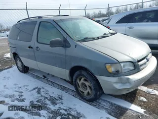 1999 Toyota Sienna LE with VIN 4T3ZF13C2XU118641, listed as a IAAI auction lot 41602097 with 261,792 mi miles. Bid and sale history available at carsss.com. Image 1.
