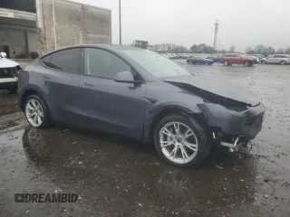 2023 Tesla Model Y Long Range with VIN 7SAYGDEE8PF895293, listed as a Copart auction lot 44208615 with 16,549 mi miles and Salvage Title. Bid and sale history available at DreamBid. Image 4.