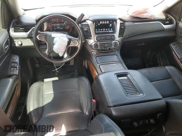 2017 Chevrolet Tahoe Premier with VIN 1GNSCCKC5HR212660, listed as a Copart auction lot 56337065 with 135,989 mi miles and Salvage title. Bid and sale history available at DreamBid. Image 8.