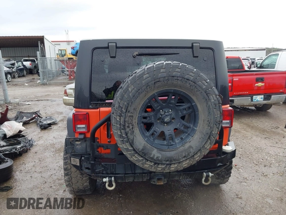 2015 Jeep Wrangler Unlimited Sahara with VIN 1C4BJWEG6FL603265, listed as a IAAI auction lot 41956606 with 70,983 mi miles. Bid and sale history available at carsss.com. Image 16.